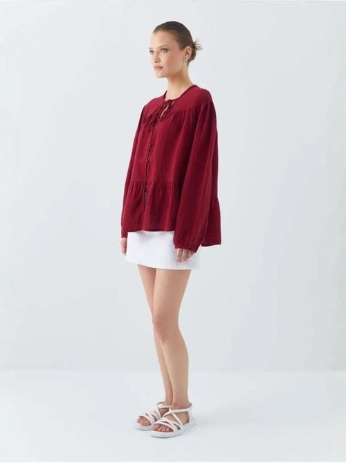 Blusa de manga comprida de corte descontraído com laço no decote mixray - Kiabi Blusa de manga comprida de corte descontraído com laço no decote mixray - Kiabi