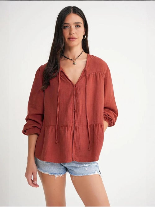Blusa de manga comprida de corte descontraído com laço no decote mixray - Kiabi Blusa de manga comprida de corte descontraído com laço no decote mixray - Kiabi