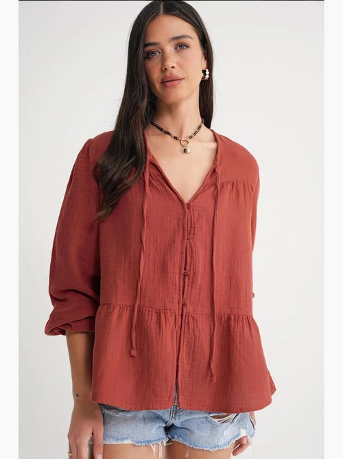Blusa de manga comprida de corte descontraído com laço no decote mixray - Kiabi Blusa de manga comprida de corte descontraído com laço no decote mixray - Kiabi