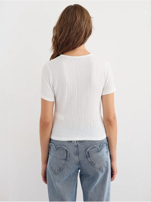 Blusa de manga curta com atilhos - Kiabi Blusa de manga curta com atilhos - Kiabi