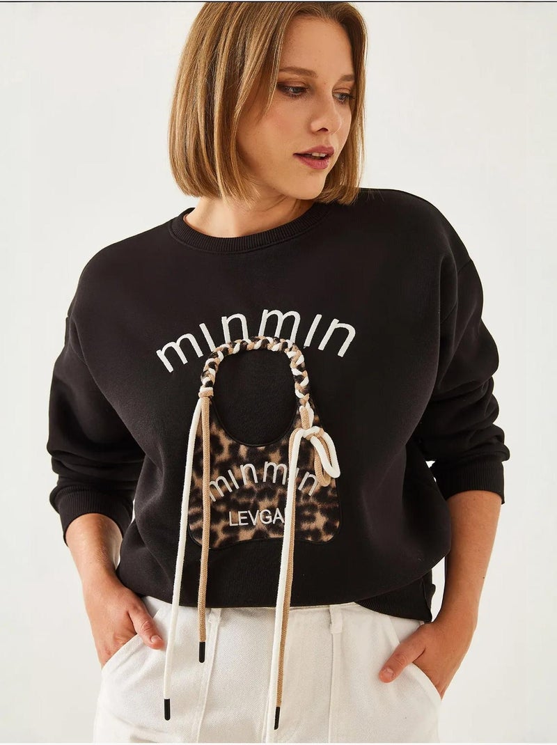 Blusa de moletão bordada com padrão leopardo lucci Preto - Kiabi