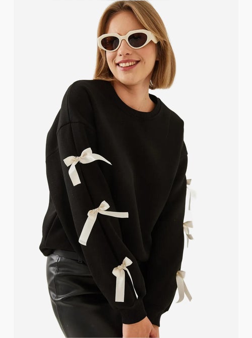 Blusa de moletom escovada de três fios com mangas de laço lucci - Kiabi Blusa de moletom escovada de três fios com mangas de laço lucci - Kiabi