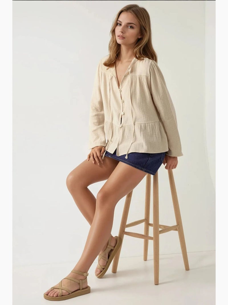 Blusa de musselina tecida com decote redondo e manga comprida hiccup Bege-argila - Kiabi