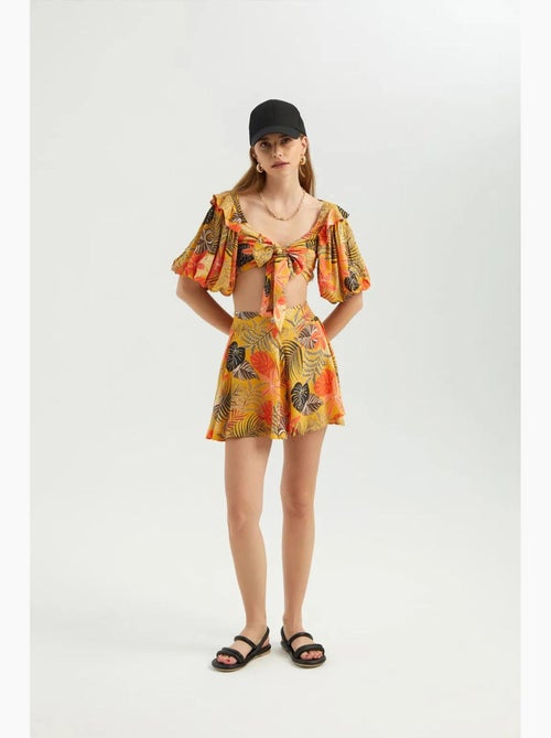 Blusa decote coração laço mangas bufantes hiccup - Kiabi Blusa decote coração laço mangas bufantes hiccup - Kiabi