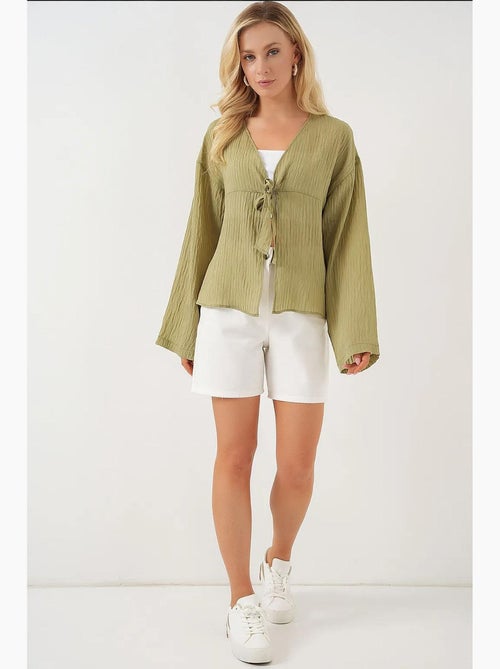 Blusa decote em v com laço bdart - Kiabi Blusa decote em v com laço bdart - Kiabi