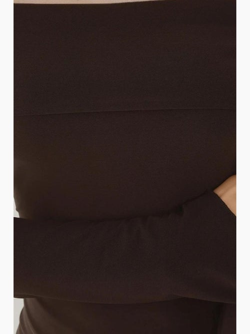 Blusa elegante com decote em bico e manga comprida, corte slim hiccup - Kiabi Blusa elegante com decote em bico e manga comprida, corte slim hiccup - Kiabi