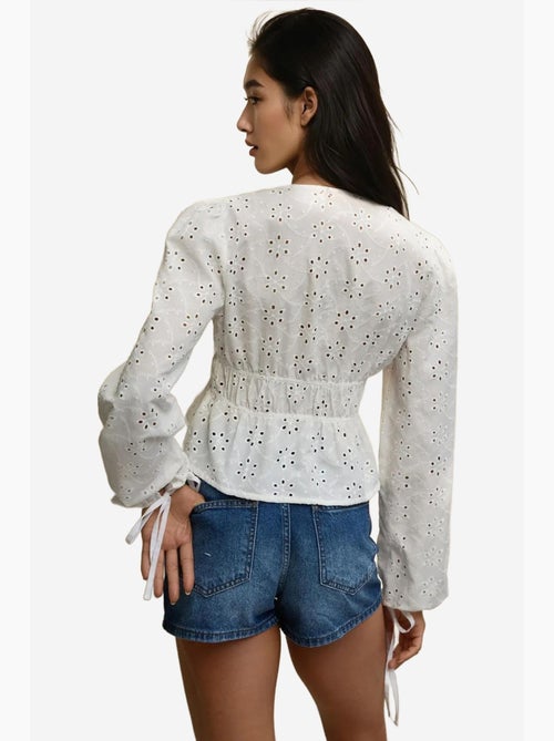 Blusa elegante texturada com decote em v e mangas balão hiccup - Kiabi Blusa elegante texturada com decote em v e mangas balão hiccup - Kiabi