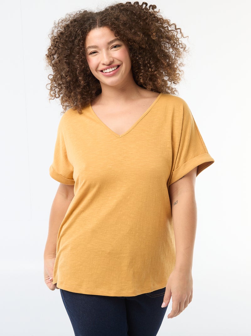 Blusa em material crepe com mangas curtas Bege - Kiabi