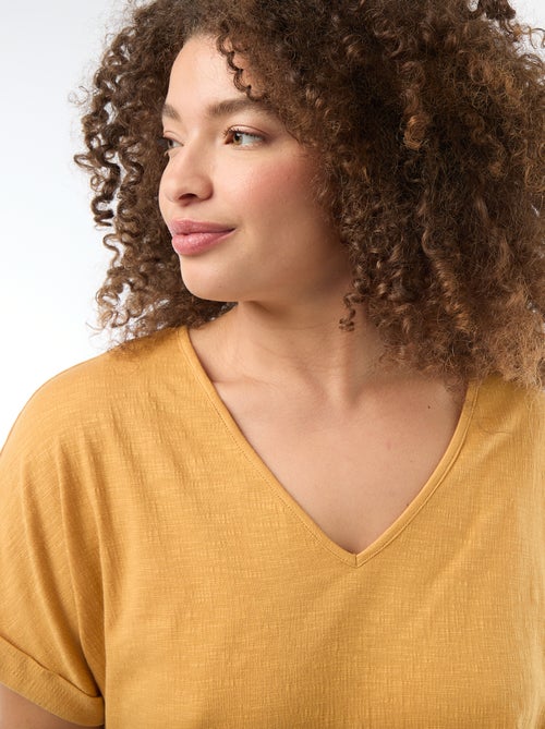 Blusa em material crepe com mangas curtas - Kiabi