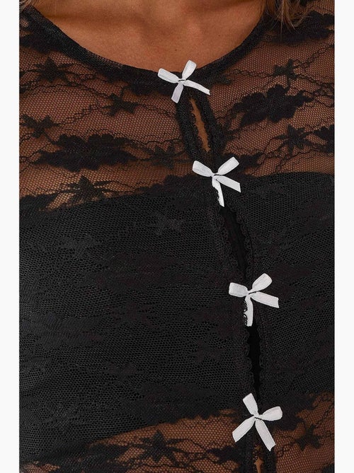 Blusa em renda com detalhe de laço hiccup - Kiabi Blusa em renda com detalhe de laço hiccup - Kiabi