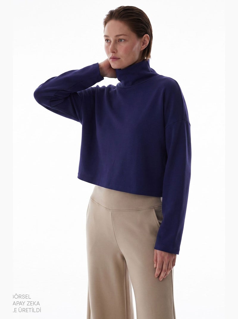 Blusa feminina em modal com gola alta e manga longa penti Azul-marinho - Kiabi