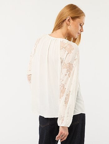 Blusa fluida com mangas em renda transparente