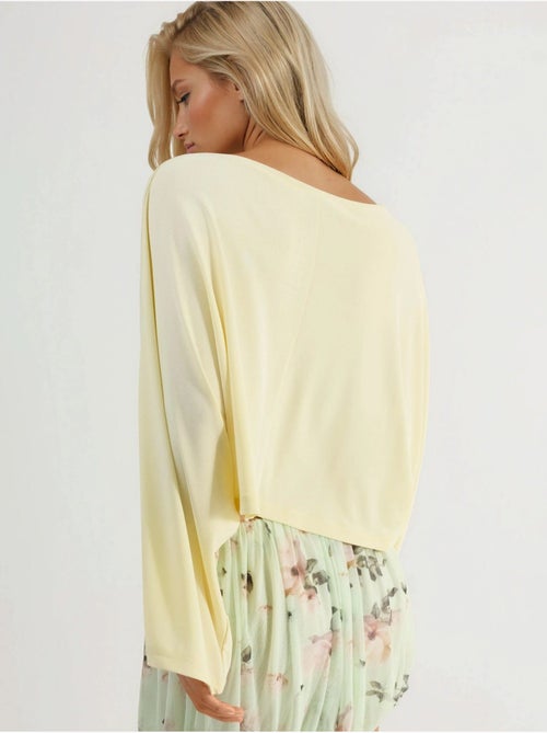 Blusa larga com decote barco busem - Kiabi