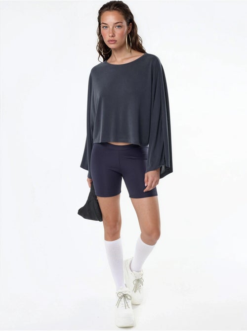 Blusa larga com decote barco busem - Kiabi