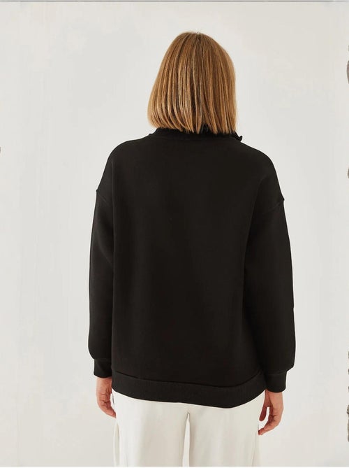 Blusa oversize escovada com gola alta e fecho lucci - Kiabi Blusa oversize escovada com gola alta e fecho lucci - Kiabi