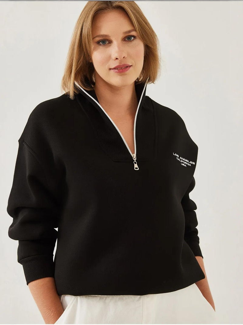 Blusa oversize escovada com gola alta e fecho lucci Preto - Kiabi