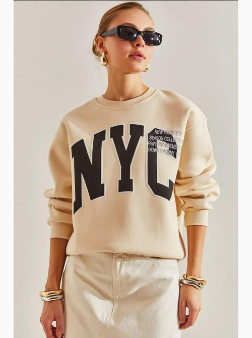 Blusa oversized com estampado escovado e três camadas lucci - Kiabi
