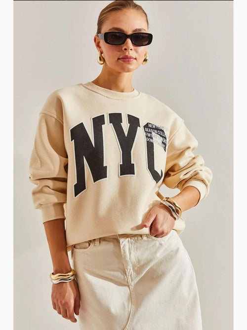 Blusa oversized com estampado escovado e três camadas lucci - Kiabi
