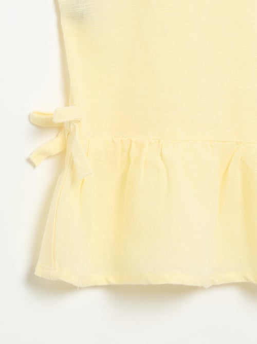 Blusa peplum com laços fantasia - Kiabi