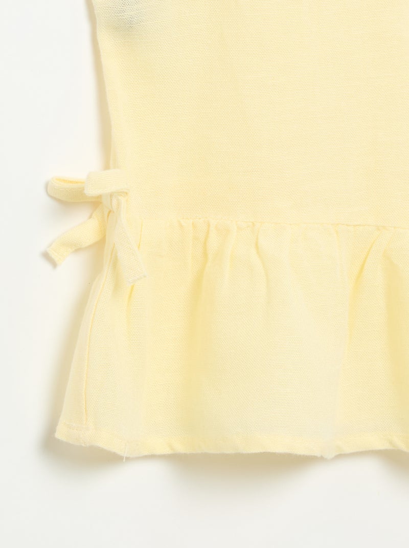 Blusa peplum com laços fantasia Amarelo - Kiabi