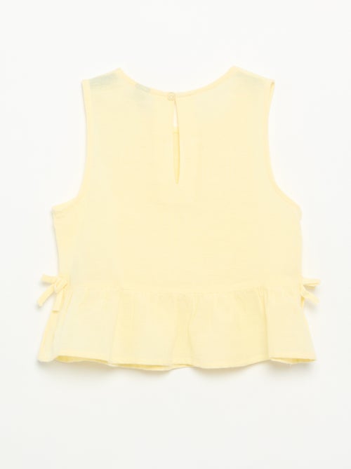 Blusa peplum com laços fantasia - Kiabi