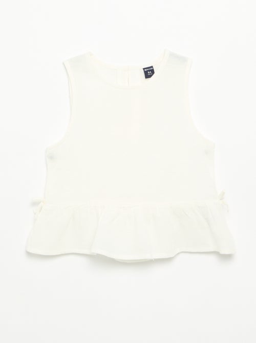 Blusa peplum com laços fantasia - Kiabi