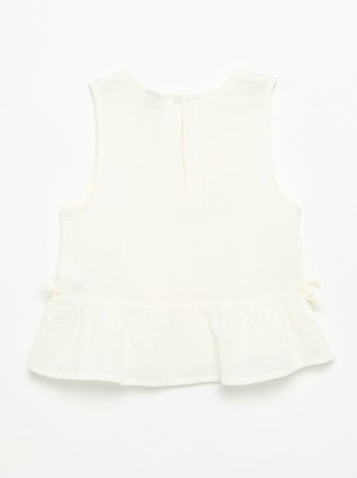 Blusa peplum com laços fantasia - Kiabi