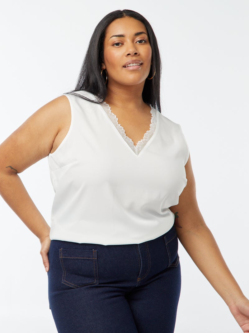 Blusa sem mangas com decote em bico e bordos de renda Branco - Kiabi