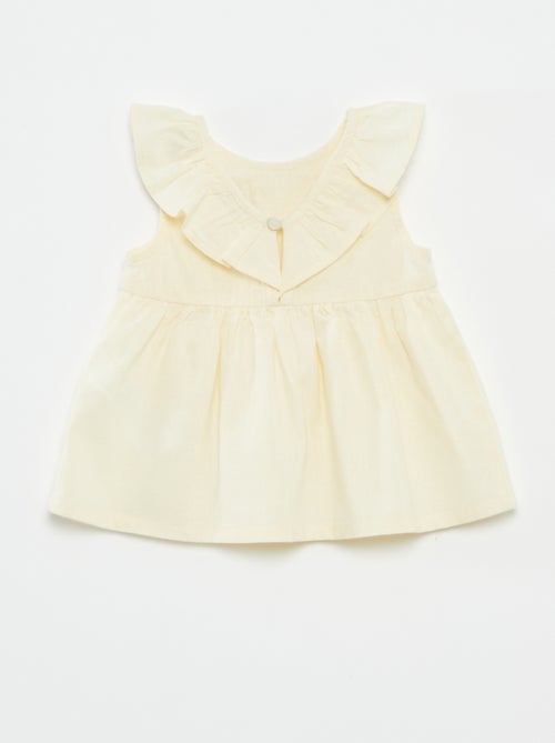 Blusa sem mangas com peitilho com folhos - Kiabi