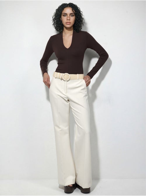 Blusa slim de manga comprida com decote em v busem - Kiabi Blusa slim de manga comprida com decote em v busem - Kiabi