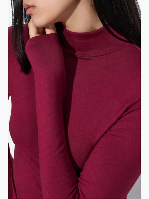 Blusa slim fit com meia gola alta busem - Kiabi Blusa slim fit com meia gola alta busem - Kiabi