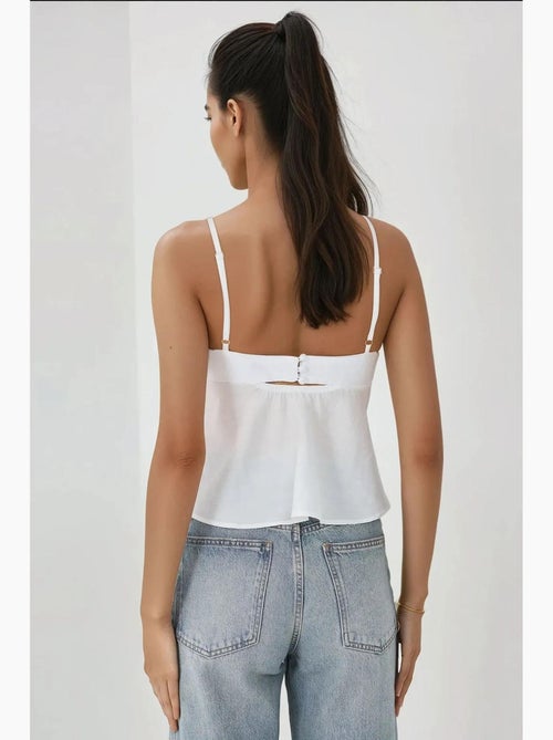 Blusa soft touch com decote em v e detalhe de laço hiccup - Kiabi Blusa soft touch com decote em v e detalhe de laço hiccup - Kiabi