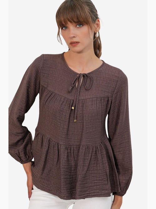 Blusa texturizada nó frontal bdart - Kiabi Blusa texturizada nó frontal bdart - Kiabi