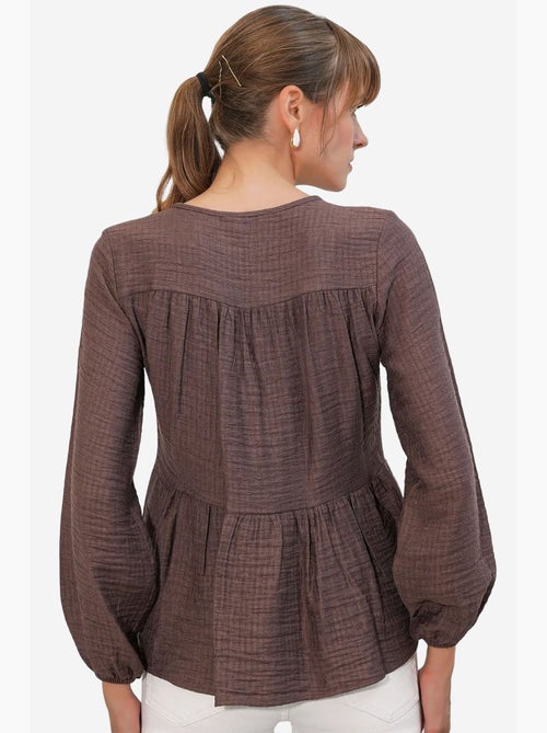Blusa texturizada nó frontal bdart - Kiabi Blusa texturizada nó frontal bdart - Kiabi