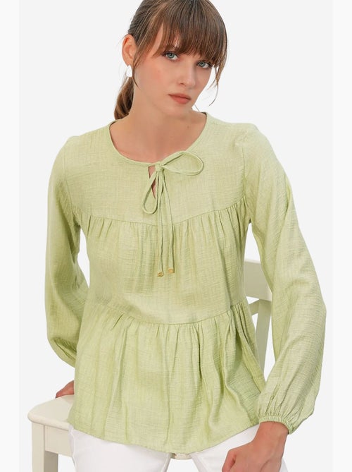 Blusa texturizada nó frontal bdart - Kiabi Blusa texturizada nó frontal bdart - Kiabi