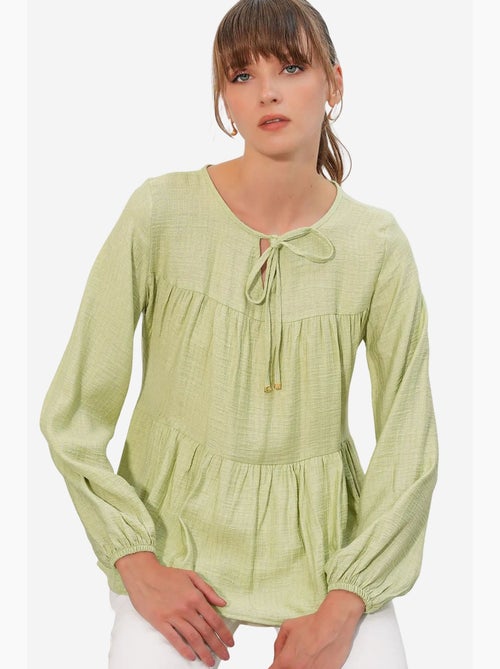 Blusa texturizada nó frontal bdart - Kiabi Blusa texturizada nó frontal bdart - Kiabi