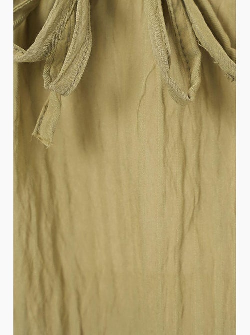 Blusa texturizada seersucker decote em v com laço bdart - Kiabi Blusa texturizada seersucker decote em v com laço bdart - Kiabi