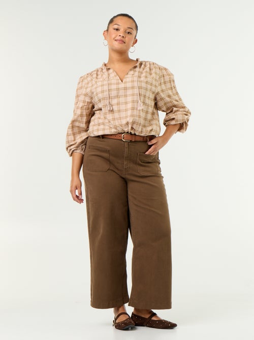Blusa xadrez com decote com laço - Kiabi Blusa xadrez com decote com laço - Kiabi