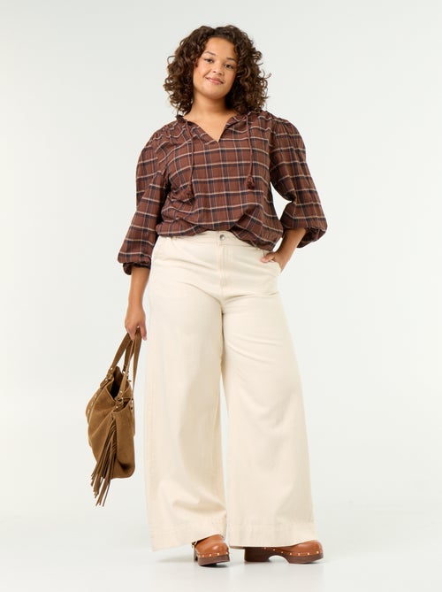 Blusa xadrez com decote com laço - Kiabi Blusa xadrez com decote com laço - Kiabi