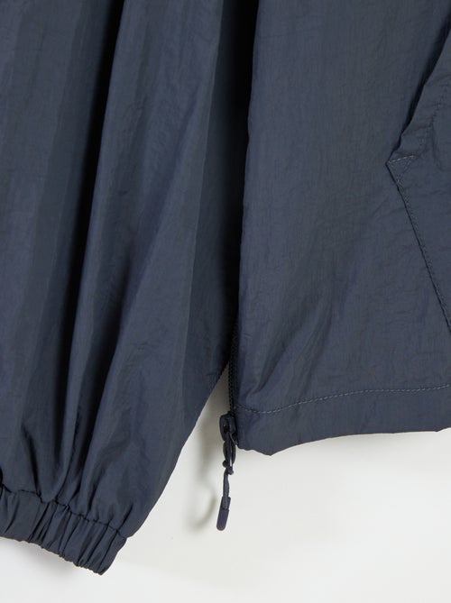 Blusão de chuva com capuz - coleção fácil de vestir - Kiabi