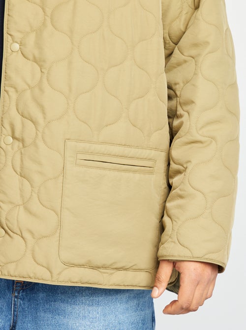 Blusão de penas acolchoado com mangas amovíveis - Kiabi