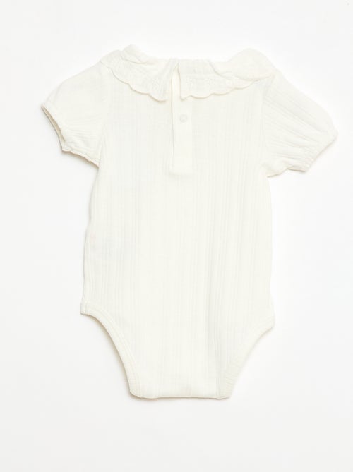 Body de manga comprida em malha canelada com gola fantasia - Kiabi