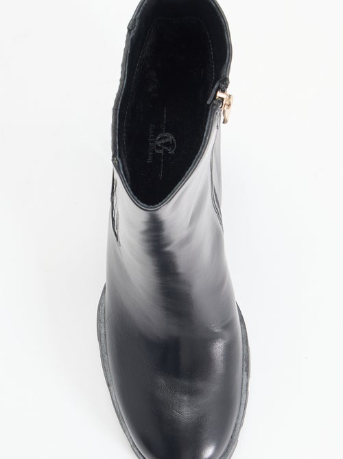 Botas em imitação de pele de salto alto - Kiabi Botas em imitação de pele de salto alto - Kiabi