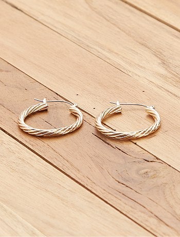Brincos tipo crioulas torcidos dourados - Kiabi