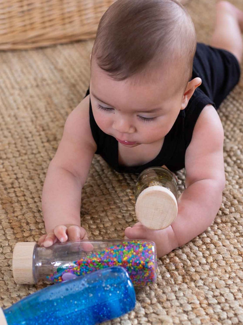 Brinquedo sensorial garrafa com som para bebé | petit boum Azul - Kiabi