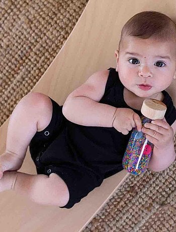 Brinquedo sensorial garrafa para bebê spy | petit boum