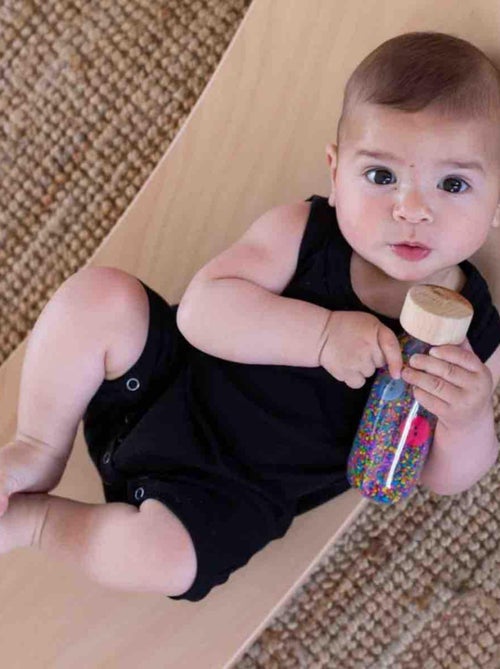 Brinquedo sensorial garrafa para bebê spy | petit boum - Kiabi