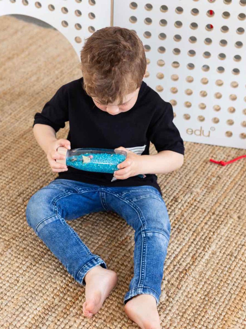 Brinquedo sensorial garrafa para bebê spy | petit boum Azul - Kiabi
