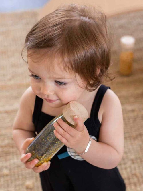 Brinquedo sensorial garrafa para bebê spy | petit boum - Kiabi