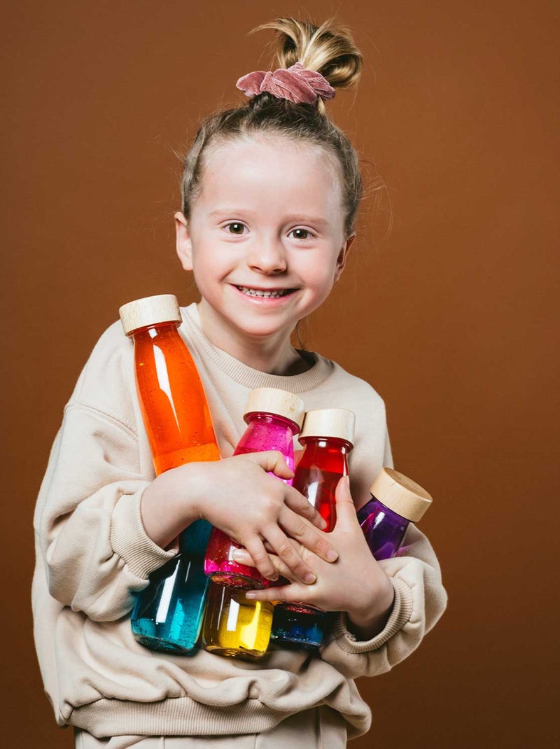 Brinquedo sensorial para bebê garrafa flutuante | petit boum Azul - Kiabi